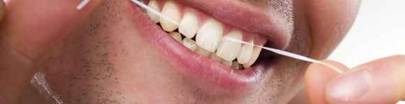 Header - Flossing Teeth